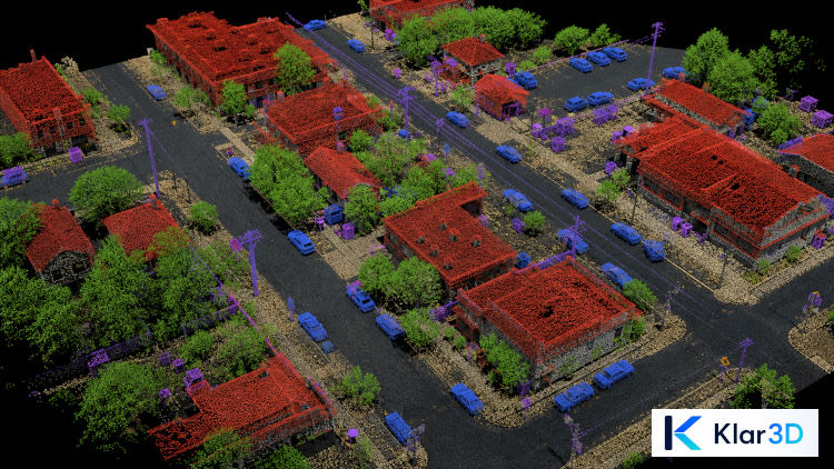Classified urban aerial point cloud with buildings, roads, trees, and vehicles shown in separate colors